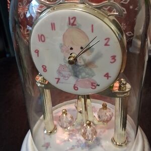 Elegant Gold and White Rotating Clock